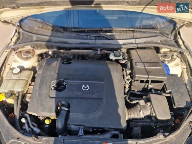 Серый Мазда 3, объемом двигателя 1.56 л и пробегом 320 тыс. км за 5800 $, фото 11 на Automoto.ua