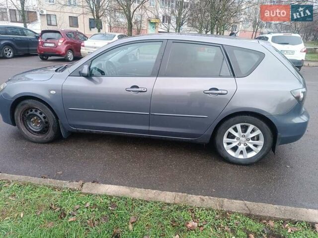 Серый Мазда 3, объемом двигателя 1.56 л и пробегом 269 тыс. км за 5200 $, фото 3 на Automoto.ua