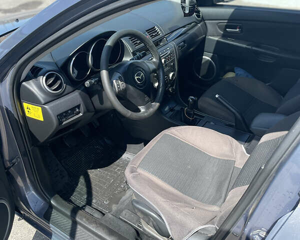 Сірий Мазда 3, об'ємом двигуна 1.6 л та пробігом 290 тис. км за 5200 $, фото 11 на Automoto.ua