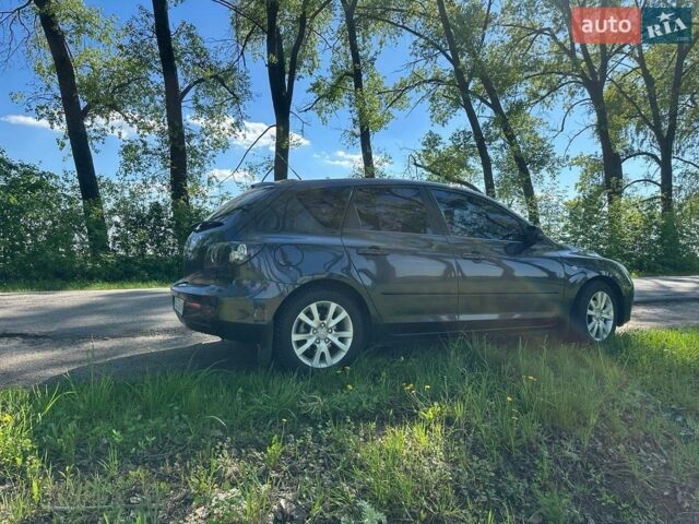 Серый Мазда 3, объемом двигателя 1.6 л и пробегом 223 тыс. км за 5600 $, фото 2 на Automoto.ua