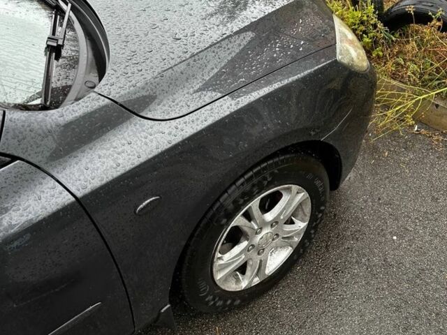 Серый Мазда 3, объемом двигателя 1.6 л и пробегом 190 тыс. км за 5000 $, фото 3 на Automoto.ua