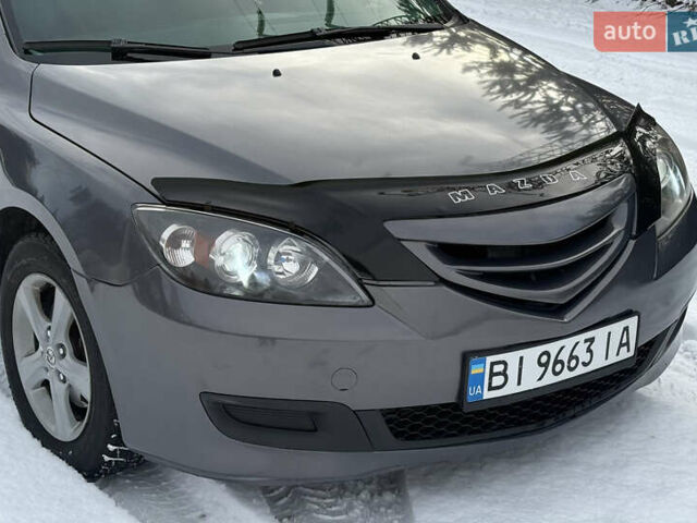 Серый Мазда 3, объемом двигателя 1.6 л и пробегом 200 тыс. км за 5999 $, фото 28 на Automoto.ua