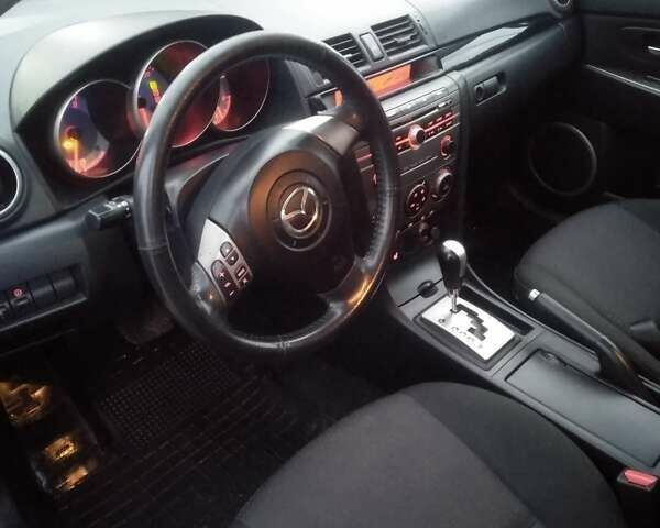 Серый Мазда 3, объемом двигателя 1.6 л и пробегом 128 тыс. км за 4850 $, фото 10 на Automoto.ua