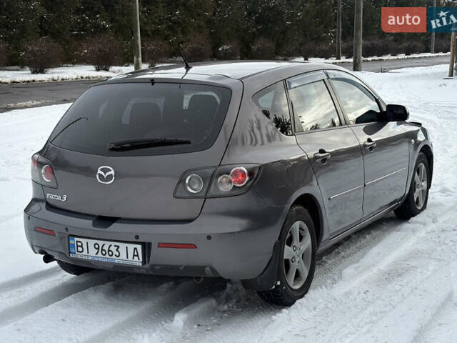 Серый Мазда 3, объемом двигателя 1.6 л и пробегом 200 тыс. км за 5999 $, фото 7 на Automoto.ua