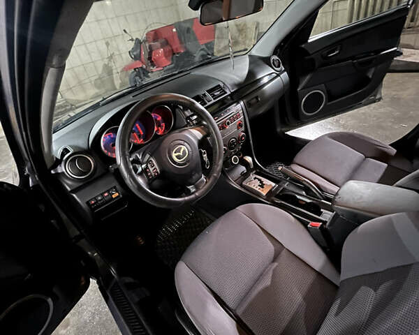 Серый Мазда 3, объемом двигателя 1.6 л и пробегом 249 тыс. км за 3900 $, фото 14 на Automoto.ua