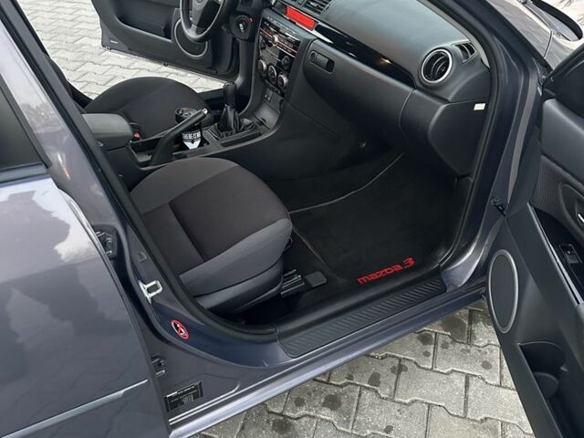 Серый Мазда 3, объемом двигателя 1.6 л и пробегом 59 тыс. км за 7000 $, фото 9 на Automoto.ua