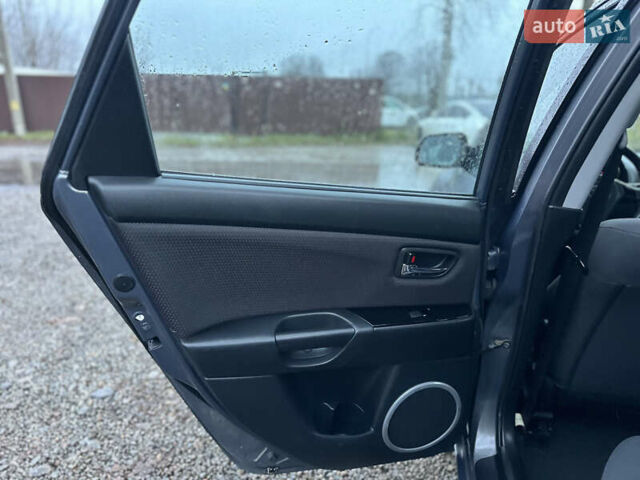 Сірий Мазда 3, об'ємом двигуна 1.6 л та пробігом 253 тис. км за 5700 $, фото 30 на Automoto.ua
