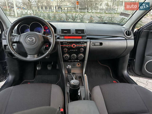 Серый Мазда 3, объемом двигателя 1.6 л и пробегом 66 тыс. км за 6999 $, фото 9 на Automoto.ua