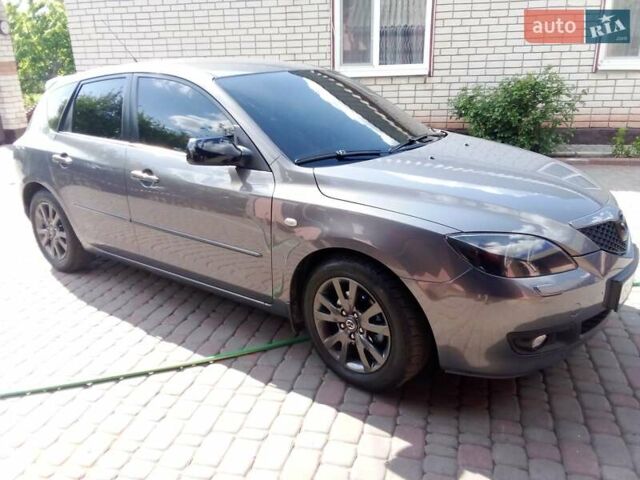 Серый Мазда 3, объемом двигателя 1.6 л и пробегом 213 тыс. км за 5500 $, фото 4 на Automoto.ua