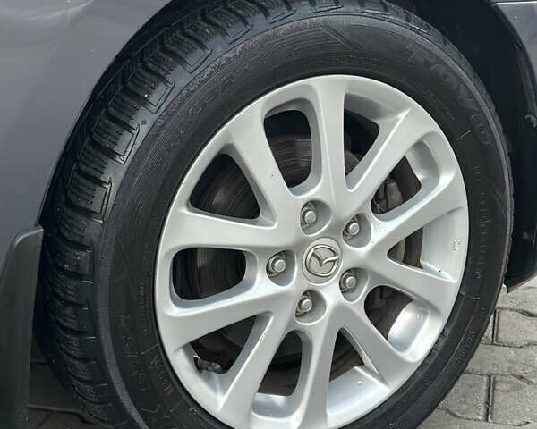 Серый Мазда 3, объемом двигателя 1.6 л и пробегом 66 тыс. км за 6999 $, фото 17 на Automoto.ua