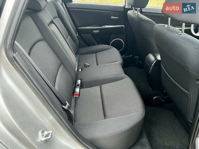 Серый Мазда 3, объемом двигателя 1.6 л и пробегом 163 тыс. км за 6250 $, фото 25 на Automoto.ua