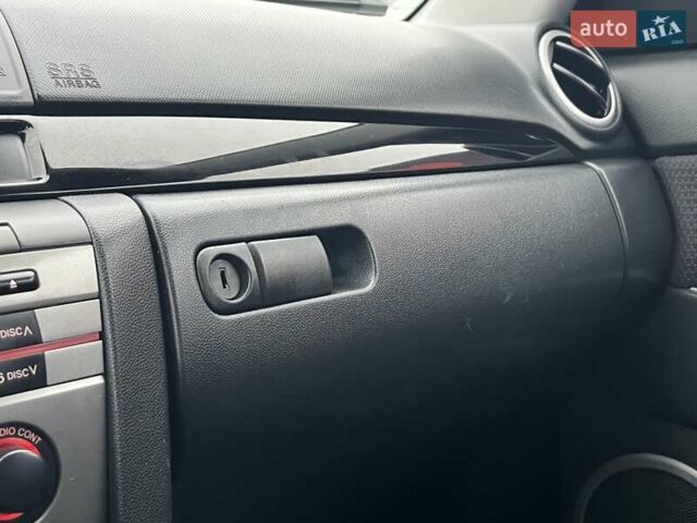Сірий Мазда 3, об'ємом двигуна 1.6 л та пробігом 195 тис. км за 5699 $, фото 31 на Automoto.ua