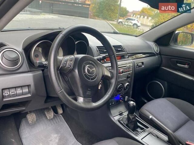 Серый Мазда 3, объемом двигателя 1.6 л и пробегом 154 тыс. км за 4450 $, фото 5 на Automoto.ua
