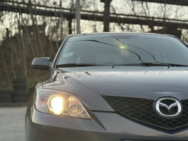 Серый Мазда 3, объемом двигателя 1.6 л и пробегом 59 тыс. км за 7000 $, фото 7 на Automoto.ua