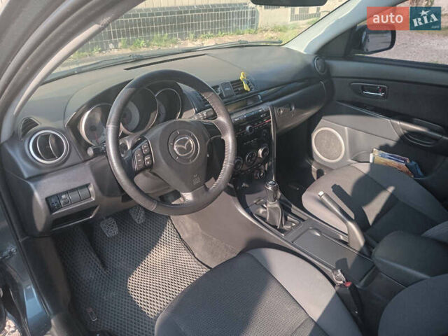 Серый Мазда 3, объемом двигателя 1.6 л и пробегом 215 тыс. км за 5650 $, фото 7 на Automoto.ua