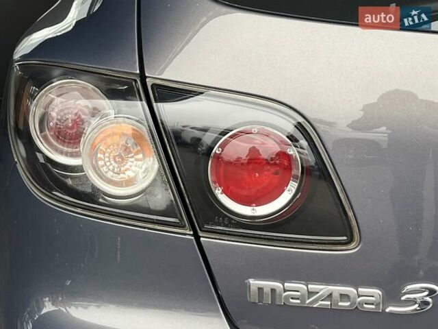 Сірий Мазда 3, об'ємом двигуна 1.6 л та пробігом 195 тис. км за 5699 $, фото 9 на Automoto.ua