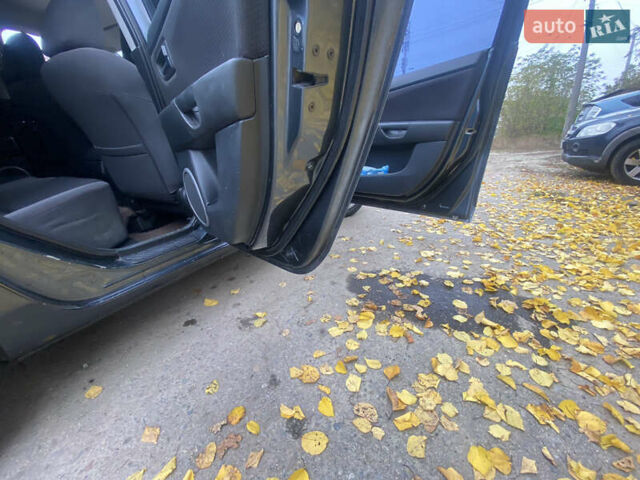 Серый Мазда 3, объемом двигателя 1.6 л и пробегом 220 тыс. км за 4200 $, фото 11 на Automoto.ua