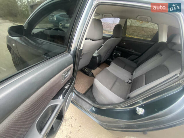 Серый Мазда 3, объемом двигателя 1.6 л и пробегом 220 тыс. км за 4200 $, фото 8 на Automoto.ua