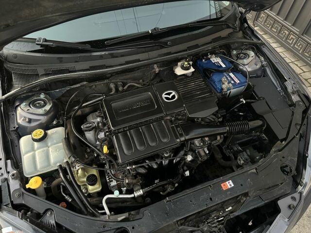 Серый Мазда 3, объемом двигателя 1.6 л и пробегом 59 тыс. км за 7000 $, фото 17 на Automoto.ua