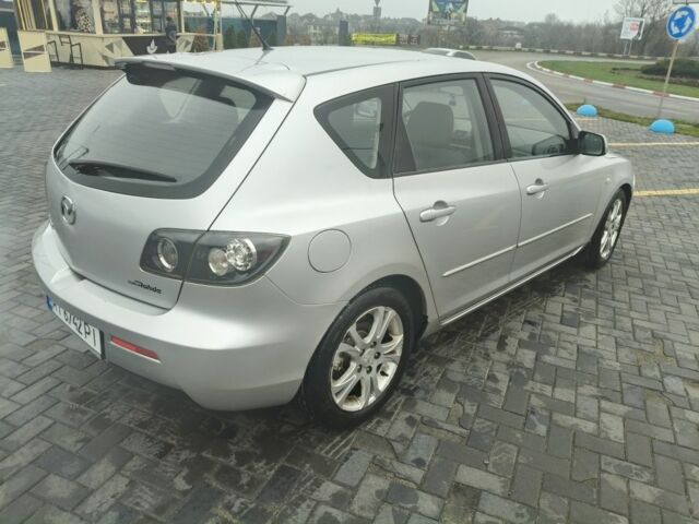 Серый Мазда 3, объемом двигателя 2 л и пробегом 250 тыс. км за 4600 $, фото 4 на Automoto.ua