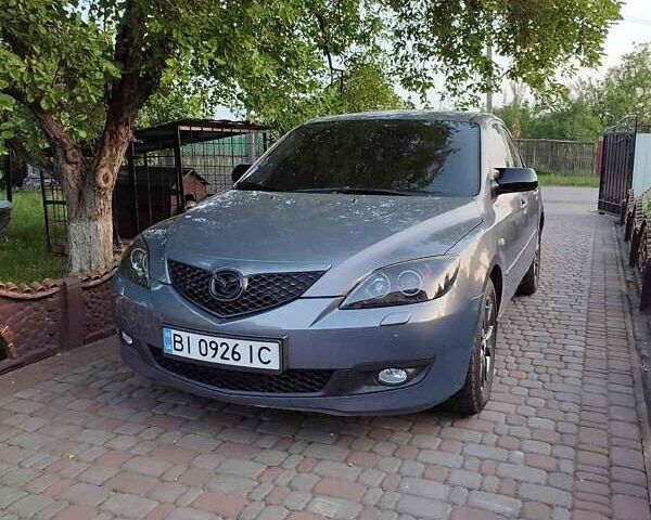 Серый Мазда 3, объемом двигателя 1.6 л и пробегом 213 тыс. км за 5500 $, фото 9 на Automoto.ua