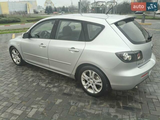 Серый Мазда 3, объемом двигателя 2 л и пробегом 250 тыс. км за 4600 $, фото 2 на Automoto.ua