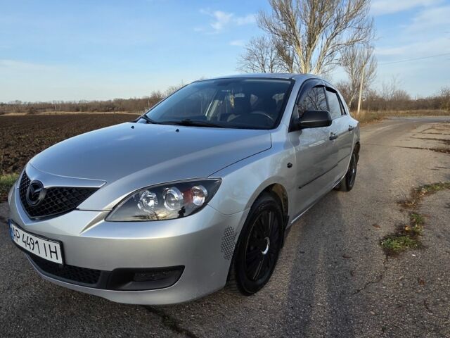 Серый Мазда 3, объемом двигателя 1.3 л и пробегом 197 тыс. км за 4600 $, фото 20 на Automoto.ua