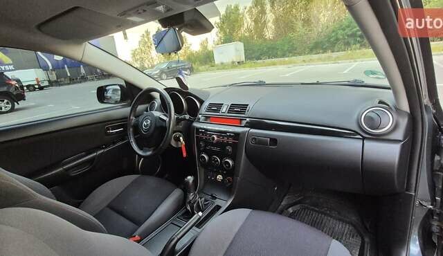 Сірий Мазда 3, об'ємом двигуна 1.6 л та пробігом 234 тис. км за 5700 $, фото 11 на Automoto.ua
