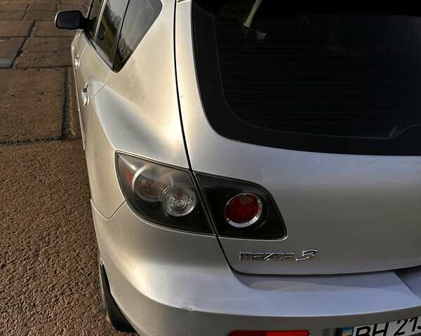 Серый Мазда 3, объемом двигателя 1.6 л и пробегом 160 тыс. км за 6000 $, фото 10 на Automoto.ua