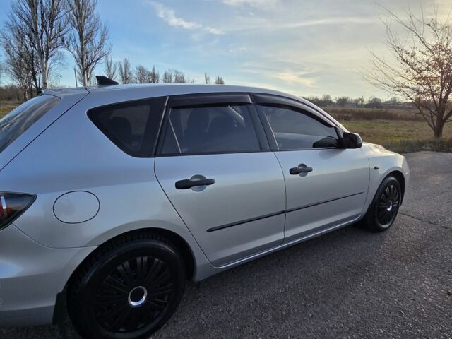 Серый Мазда 3, объемом двигателя 1.3 л и пробегом 197 тыс. км за 4600 $, фото 5 на Automoto.ua