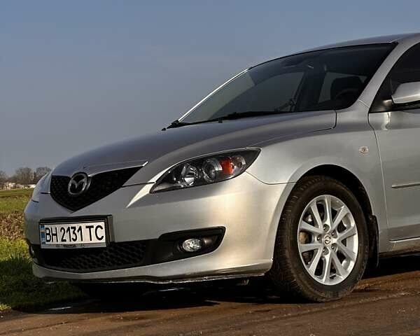 Серый Мазда 3, объемом двигателя 1.6 л и пробегом 160 тыс. км за 6000 $, фото 3 на Automoto.ua
