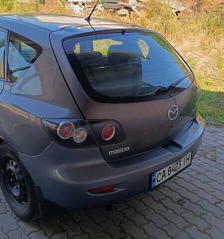 Сірий Мазда 3, об'ємом двигуна 1.3 л та пробігом 221 тис. км за 5100 $, фото 8 на Automoto.ua