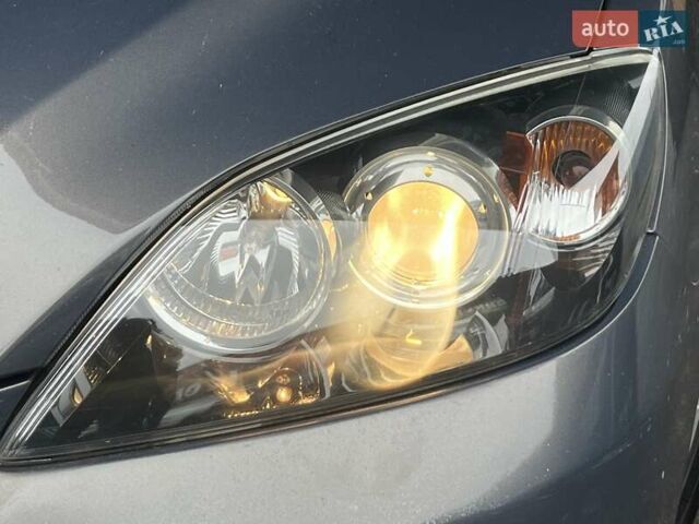 Сірий Мазда 3, об'ємом двигуна 1.6 л та пробігом 195 тис. км за 5699 $, фото 4 на Automoto.ua