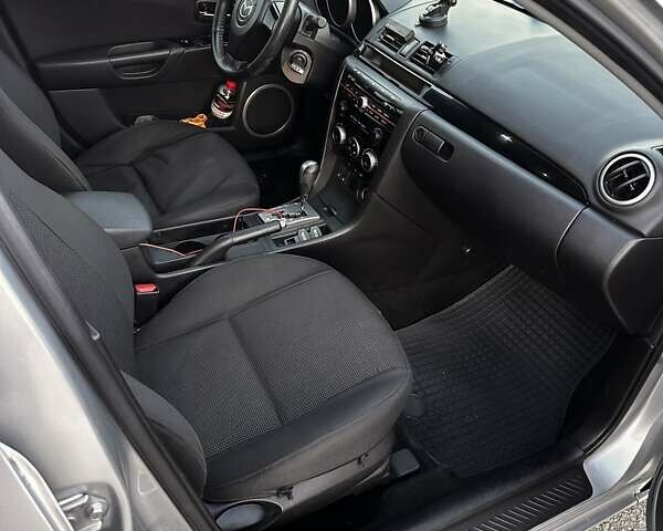 Серый Мазда 3, объемом двигателя 1.6 л и пробегом 160 тыс. км за 6000 $, фото 7 на Automoto.ua