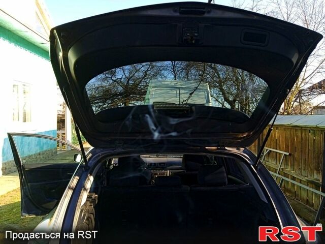 Серый Мазда 3, объемом двигателя 1.6 л и пробегом 223 тыс. км за 4800 $, фото 3 на Automoto.ua