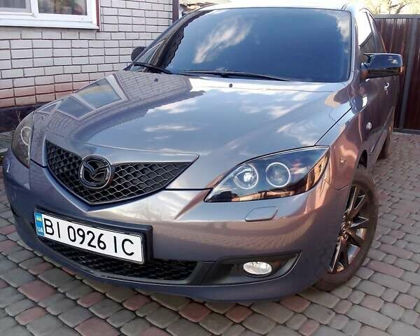 Серый Мазда 3, объемом двигателя 1.6 л и пробегом 213 тыс. км за 5500 $, фото 10 на Automoto.ua