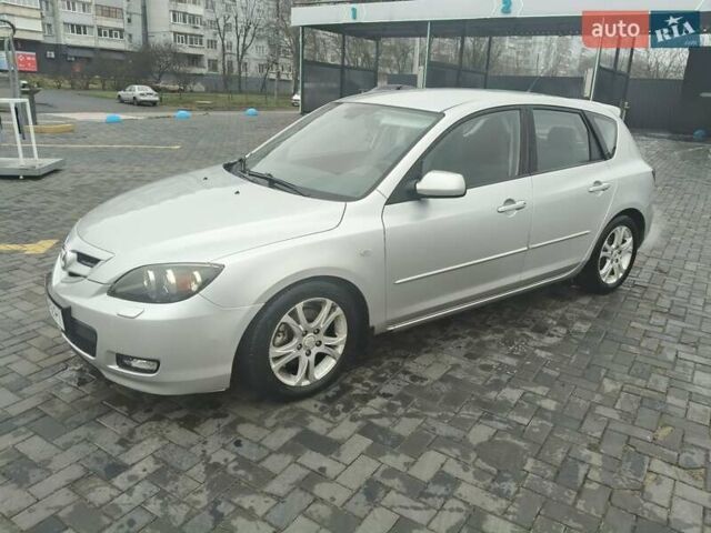 Серый Мазда 3, объемом двигателя 2 л и пробегом 250 тыс. км за 4600 $, фото 1 на Automoto.ua