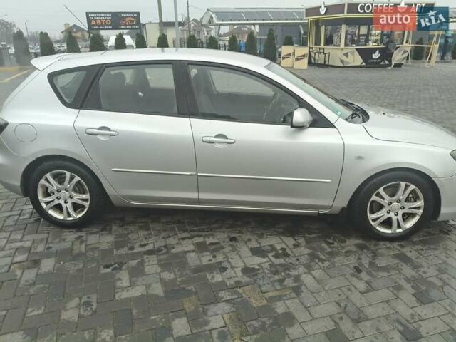 Серый Мазда 3, объемом двигателя 2 л и пробегом 250 тыс. км за 4600 $, фото 5 на Automoto.ua