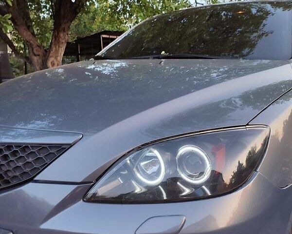 Серый Мазда 3, объемом двигателя 1.6 л и пробегом 213 тыс. км за 5500 $, фото 8 на Automoto.ua