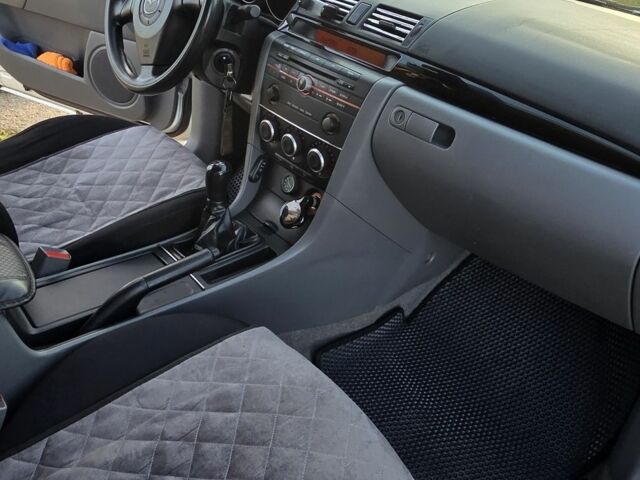 Серый Мазда 3, объемом двигателя 1.3 л и пробегом 197 тыс. км за 4600 $, фото 10 на Automoto.ua