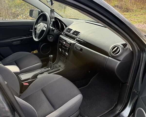 Серый Мазда 3, объемом двигателя 1.6 л и пробегом 235 тыс. км за 6200 $, фото 8 на Automoto.ua