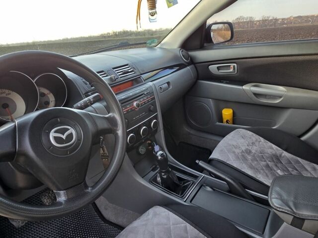 Серый Мазда 3, объемом двигателя 1.3 л и пробегом 197 тыс. км за 4600 $, фото 13 на Automoto.ua