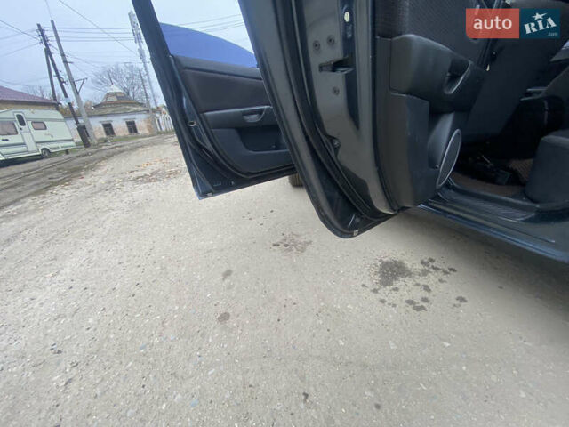 Серый Мазда 3, объемом двигателя 1.6 л и пробегом 220 тыс. км за 4200 $, фото 9 на Automoto.ua