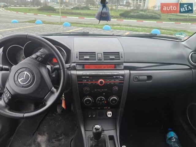 Серый Мазда 3, объемом двигателя 2 л и пробегом 250 тыс. км за 4600 $, фото 7 на Automoto.ua