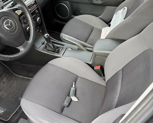 Серый Мазда 3, объемом двигателя 1.6 л и пробегом 235 тыс. км за 6200 $, фото 9 на Automoto.ua