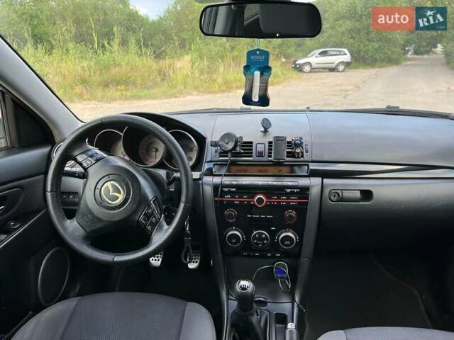 Сірий Мазда 3, об'ємом двигуна 2 л та пробігом 242 тис. км за 6700 $, фото 12 на Automoto.ua