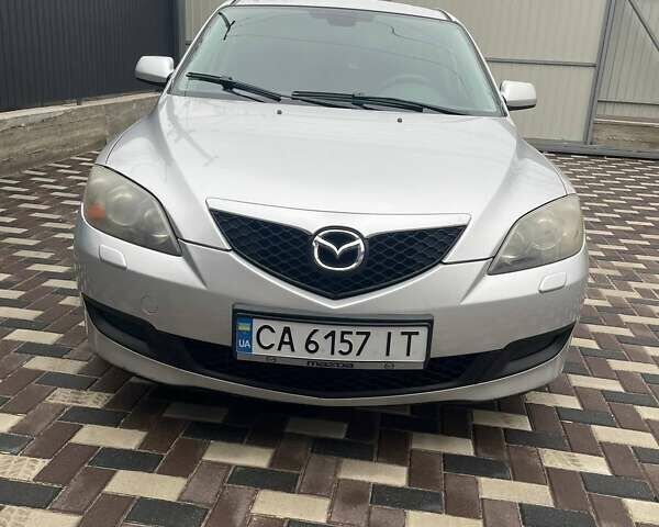 Серый Мазда 3, объемом двигателя 1.56 л и пробегом 275 тыс. км за 4600 $, фото 3 на Automoto.ua