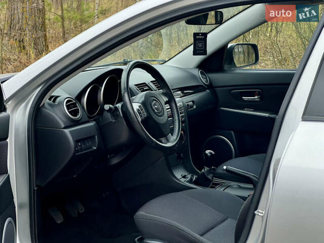 Серый Мазда 3, объемом двигателя 1.6 л и пробегом 163 тыс. км за 6250 $, фото 13 на Automoto.ua