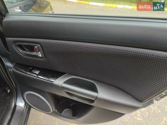 Серый Мазда 3, объемом двигателя 1.6 л и пробегом 191 тыс. км за 5500 $, фото 27 на Automoto.ua