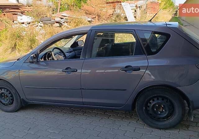 Сірий Мазда 3, об'ємом двигуна 1.3 л та пробігом 221 тис. км за 5100 $, фото 13 на Automoto.ua